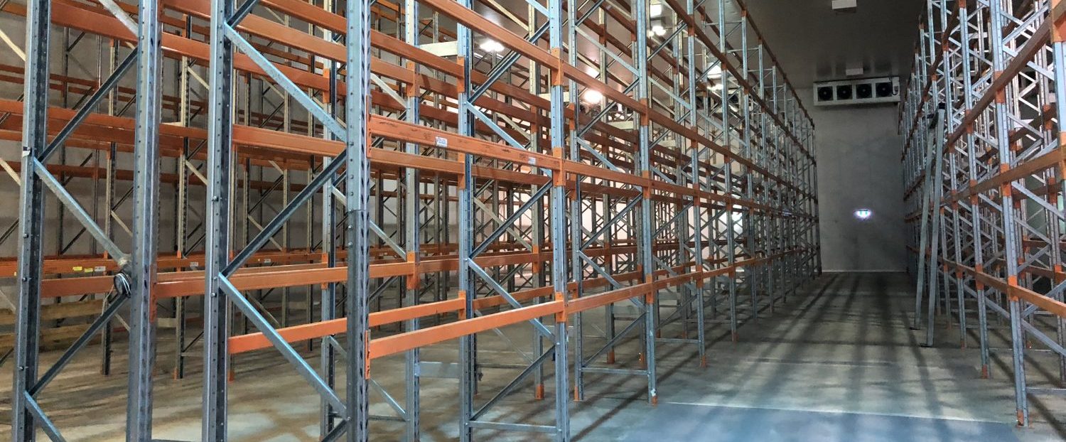 cold storage room with multiple racking filling the room