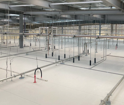 the roof space of an industrial distribution centre for Coles Supermarkets