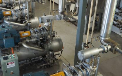 aerial view of a plant room showing compressors and other industrial refrigeration equipment